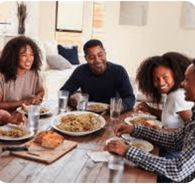 How To Balance Time Between Work And Family - having dinner with the family